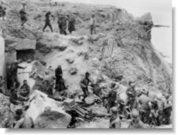 Rangers leading captured Germans towards the beach